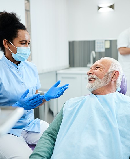 Patient talking to a dentist