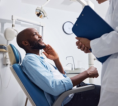 Patient talking to his dentist