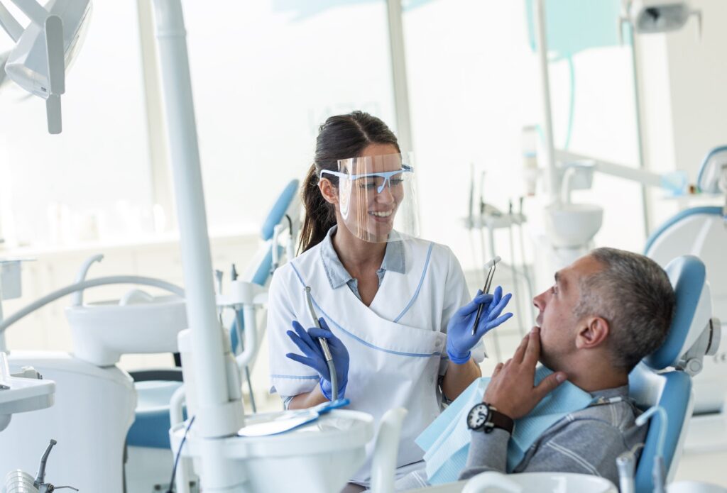 Dentist explaining treatment to patient